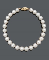 The ultimate look of elegance. This simple strand highlights A quality cultured freshwater pearls (6-7 mm) and a polished 14k gold clasp. Approximate length: 8 inches. The ultimate look of elegance. This simple strand highlights A quality cultured freshwater pearls (6-7 mm) and a polished 14k gold clasp. Approximate length: 8 inches.