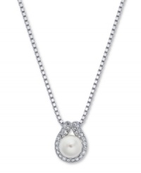 Top-notch style adds the perfect polish. Eliot Danori's elegant pendant combines shimmering silmulated pearls (8 mm) and sparkling crystals for optimum shine. Set in rhodium-plated mixed metal. Approximate length 16 inches + 2-inch extender. Approximate drop: 3/4 inch. Top-notch style adds the perfect polish. Eliot Danori's elegant pendant combines shimmering silmulated pearls (8 mm) and sparkling crystals for optimum shine. Set in rhodium-plated mixed metal. Approximate length 16 inches + 2-inch extender. Approximate drop: 3/4 inch.