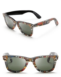So rock and roll: these classic Ray-Ban Wayfarer sunglasses hit the right note in a guitar print. So rock and roll: these classic Ray-Ban Wayfarer sunglasses hit the right note in a guitar print.