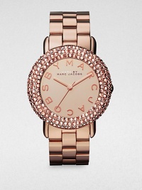 A warm timepiece with a dazzling crystal encrusted bezel. Quartz movementWater resistant to 5 ATMRound rose goldtone stainless steel case, 36mm (1.4)Crystal encrusted bezelRose goldtone dialLogo hour markersSecond hand Rose goldtone stainless steel link braceletImported A warm timepiece with a dazzling crystal encrusted bezel. Quartz movementWater resistant to 5 ATMRound rose goldtone stainless steel case, 36mm (1.4)Crystal encrusted bezelRose goldtone dialLogo hour markersSecond hand Rose goldtone stainless steel link braceletImported