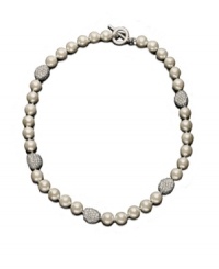 A couture collar necklace, by Lauren Ralph Lauren. Elegant glass pearl (10 mm) is accented by crystal-encrusted nuggets of silvertone mixed metal. Approximate length: 18 inches. A couture collar necklace, by Lauren Ralph Lauren. Elegant glass pearl (10 mm) is accented by crystal-encrusted nuggets of silvertone mixed metal. Approximate length: 18 inches.