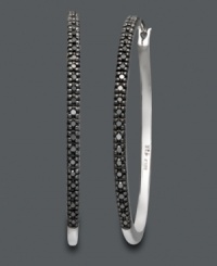 Hoops with a dark and mysterious twist. Set in sterling silver, earrings feature round-cut black diamonds (1/4 ct. t.w.). Approximate diameter: 1-1/2 inches. Hoops with a dark and mysterious twist. Set in sterling silver, earrings feature round-cut black diamonds (1/4 ct. t.w.). Approximate diameter: 1-1/2 inches.