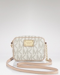 Give into compact cravings with this must-have mini bag from MICHAEL Michael Kors. Designed to make a statement after-hours, it's sized for the gadget and the gloss. Give into compact cravings with this must-have mini bag from MICHAEL Michael Kors. Designed to make a statement after-hours, it's sized for the gadget and the gloss.