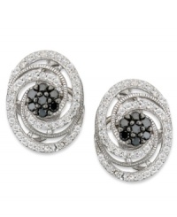 Embrace your elegant side. Wrapped in Love's™ sterling silver earrings are adorned with single-cut white diamonds (5/8 ct. t.w.) surrounding a cluster of black diamonds (1/3 ct. t.w.) for a look that's visually stunning. Approximate diameter: 1-1/4 inches. Embrace your elegant side. Wrapped in Love's™ sterling silver earrings are adorned with single-cut white diamonds (5/8 ct. t.w.) surrounding a cluster of black diamonds (1/3 ct. t.w.) for a look that's visually stunning. Approximate diameter: 1-1/4 inches.