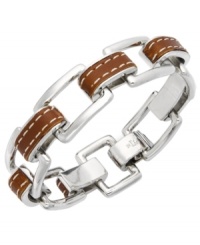 Industrial chic. This eclectic bracelet from the Lauren Ralph Lauren collection features heavy rectangular links in concert with a trendy leather band. Set in silver tone mixed metal. Approximate length: 7-3/4 inches. Industrial chic. This eclectic bracelet from the Lauren Ralph Lauren collection features heavy rectangular links in concert with a trendy leather band. Set in silver tone mixed metal. Approximate length: 7-3/4 inches.