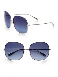 Feminine, oversized, ultra-lightweight titanium frames with polarized lenses and anti-reflective coating. Available in gold with brown gradient lens or silver with blue gradient lens.Metal temples100% UV protectionImported Feminine, oversized, ultra-lightweight titanium frames with polarized lenses and anti-reflective coating. Available in gold with brown gradient lens or silver with blue gradient lens.Metal temples100% UV protectionImported