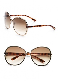 Sleek, shiny metal frames in a modern, round shape. Available in shiny light bronze with brown gradient lens. 100% UV protectionMade in Italy Sleek, shiny metal frames in a modern, round shape. Available in shiny light bronze with brown gradient lens. 100% UV protectionMade in Italy