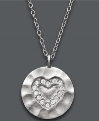 Say it from the heart. Studio Silver's darling pendant features a textured sterling silver setting and sparkling, round-cut crystals in a romantic heart shape. Approximate length: 16 inches + 2-1/2 inch-extender. Approximate drop: 3/4 inch. Say it from the heart. Studio Silver's darling pendant features a textured sterling silver setting and sparkling, round-cut crystals in a romantic heart shape. Approximate length: 16 inches + 2-1/2 inch-extender. Approximate drop: 3/4 inch.