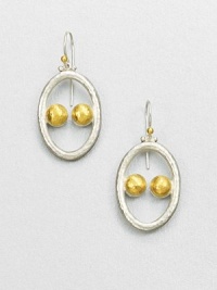 An abstract drop style with hammered sterling silver accented with radiant 24k gold. Sterling silver24k goldDrop, about 1Hook backImported An abstract drop style with hammered sterling silver accented with radiant 24k gold. Sterling silver24k goldDrop, about 1Hook backImported