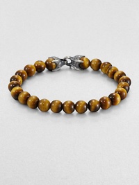 A natural look is a fabulous match for any ensemble, laced with smooth tiger's eye beads.Silver chevron clasp8 mm beadsAbout 8½ longImported A natural look is a fabulous match for any ensemble, laced with smooth tiger's eye beads.Silver chevron clasp8 mm beadsAbout 8½ longImported