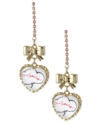 Support a worthy cause in style. The I'm a Survivor linear drop earrings from Betsey Johnson are crafted from gold-tone mixed metal, and feature accents in the iconic pink. Approximate drop: 2-1/2/ inches. Support a worthy cause in style. The I'm a Survivor linear drop earrings from Betsey Johnson are crafted from gold-tone mixed metal, and feature accents in the iconic pink. Approximate drop: 2-1/2/ inches.