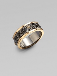 A stunning two-tone ring featuring an outer band plated in luscious rose gold and a spinning interior band of intricately designed blackened sterling silver.Black rhodium and rose gold-plated silverWidth, about ½Diameter, about 1Imported A stunning two-tone ring featuring an outer band plated in luscious rose gold and a spinning interior band of intricately designed blackened sterling silver.Black rhodium and rose gold-plated silverWidth, about ½Diameter, about 1Imported