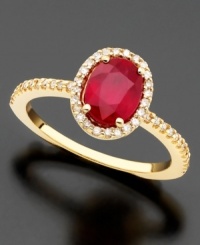 An oval-cut ruby (1-3/8 ct. t.w.) revels in a regal setting of 14k gold and round-cut diamonds (1/4 ct. t.w.) on this Effy Collection ring. An oval-cut ruby (1-3/8 ct. t.w.) revels in a regal setting of 14k gold and round-cut diamonds (1/4 ct. t.w.) on this Effy Collection ring.