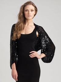 Sequin crochet in an easy-fitting tube shape fits over the shoulders for a glamorous evening look. Rayon; dry clean One size fits most Imported Sequin crochet in an easy-fitting tube shape fits over the shoulders for a glamorous evening look. Rayon; dry clean One size fits most Imported