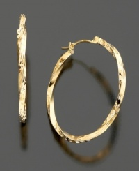 Do the twist. These fun hoops are made to be noticed in 14k yellow gold. Do the twist. These fun hoops are made to be noticed in 14k yellow gold.