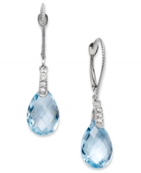 Take your look to the next level with the right amount of color. Pear-cut blue topaz (7 ct. t.w.) adds the sparkle to these shining 14k white gold earrings with diamond accents. Approximate drop: 1-1/4 inches. Take your look to the next level with the right amount of color. Pear-cut blue topaz (7 ct. t.w.) adds the sparkle to these shining 14k white gold earrings with diamond accents. Approximate drop: 1-1/4 inches.