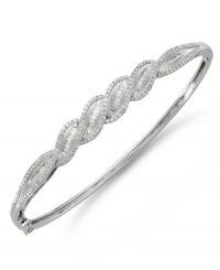 Subtly sparkling and precisely detailed, this elegant bracelet is boldly dramatic yet timeless. Crafted in sterling silver with round and baguette-cut diamonds (1 ct. t.w.). Approximate diameter: 2-1/2 inches. Subtly sparkling and precisely detailed, this elegant bracelet is boldly dramatic yet timeless. Crafted in sterling silver with round and baguette-cut diamonds (1 ct. t.w.). Approximate diameter: 2-1/2 inches.