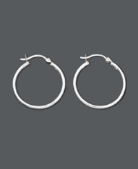 A classic piece that every woman should own. Simple smooth hoop earrings set in sterling silver. Approximate diameter: 1 inch. A classic piece that every woman should own. Simple smooth hoop earrings set in sterling silver. Approximate diameter: 1 inch.