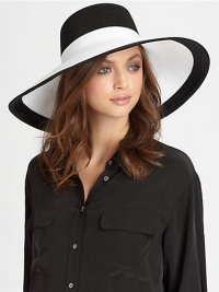 A colorblocked design adds a stylish touch to this dramatic, lightweight topper with elasticized inner band and an oversized brim for maximum sun protection.Brim, about 6.5Elasticized inner band fits most95% UVA/UVB protectionPolypropylene/rayon/polyesterSpot cleanImported and hand-finished in the USA