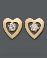Simply sweet. Polished 14k gold hearts frame gleaming cubic zirconia accents in these stud earrings for a special little girl. Simply sweet. Polished 14k gold hearts frame gleaming cubic zirconia accents in these stud earrings for a special little girl.