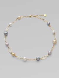 A gorgeous blend of different colored pearls with 18k goldplated sterling silver links. 10mm and 12mm round white, champagne, grey and black organic hand-made pearls 18k goldplated sterling silver Lobster clasp closure Length, about 16 to 18 adjustable Imported 