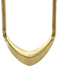 Futuristic fashion. Vince Camuto's double-chain statement pendant necklace is crafted from gold-tone mixed metal, giving it a post-modern look. Approximate length: 18 inches. Futuristic fashion. Vince Camuto's double-chain statement pendant necklace is crafted from gold-tone mixed metal, giving it a post-modern look. Approximate length: 18 inches.