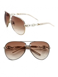 A modern metal frame with decorative chain and logo temples. Available in ruthenium with brown azur gradient lens. Chain and logo temples100% UV protectionMade in Italy A modern metal frame with decorative chain and logo temples. Available in ruthenium with brown azur gradient lens. Chain and logo temples100% UV protectionMade in Italy