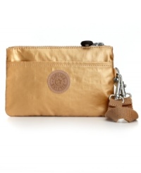 Simple, sleek and completely essential, this petite purse from Kipling is the ultimate grab-and-go accessory. Dressed up in shimmery metallic and custom hardware, it's perfect for an evening out or running quick errands in your 'hood. Simple, sleek and completely essential, this petite purse from Kipling is the ultimate grab-and-go accessory. Dressed up in shimmery metallic and custom hardware, it's perfect for an evening out or running quick errands in your 'hood.