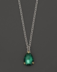 A faceted, pear-cut green quartz, set in sterling silver with an 18K gold accent, adds timeless style to this necklace. A faceted, pear-cut green quartz, set in sterling silver with an 18K gold accent, adds timeless style to this necklace.