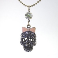 DaisyJewel Presents: Pink Bow Marcasite Crystal Skull Necklace - Betsey Johnson - Top Seller - This 3D Skull is a Favorite and Covered with the Dark Smoky Sparkle of Pave Marcasite, Topped with Pink Enamel Bow and Charmed with a Diamond-Like Crystal, On a