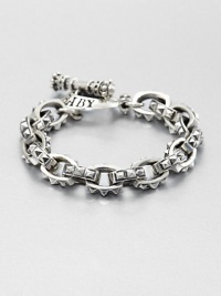 A rugged, refined design of sterling silver with signature logo detail and modernized pyramids linked together to form a chain bracelet.Sterling silverDiameter, about 3Toggle claspMade in USA A rugged, refined design of sterling silver with signature logo detail and modernized pyramids linked together to form a chain bracelet.Sterling silverDiameter, about 3Toggle claspMade in USA