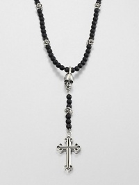 A traditional cross pendant is suspended from an impeccable strand of black onyx beads with sculpted skull detail for an edgy, modern update.Sterling silverBlack onyxLength about 26Toggle claspMade in USA A traditional cross pendant is suspended from an impeccable strand of black onyx beads with sculpted skull detail for an edgy, modern update.Sterling silverBlack onyxLength about 26Toggle claspMade in USA