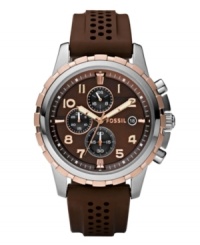 Sport style never looked so handsome. Dean collection watch by Fossil crafted of brown perforated silicone strap and round stainless steel case with rose-gold plating at bezel. Brown chronograph dial features applied rose-gold numerals, white minute track, date window at three o'clock, three subdials, three hands and logo. Quartz movement. Water resistant to 50 meters. Eleven-year limited warranty. Sport style never looked so handsome. Dean collection watch by Fossil crafted of brown perforated silicone strap and round stainless steel case with rose-gold plating at bezel. Brown chronograph dial features applied rose-gold numerals, white minute track, date window at three o'clock, three subdials, three hands and logo. Quartz movement. Water resistant to 50 meters. Eleven-year limited warranty.