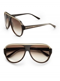 Oversized acetate aviators with stud detail embellishments and Balenciaga logo on temple. Available in horn walnut crystal with brown gradient lens.100% UV protection Made in Italy Oversized acetate aviators with stud detail embellishments and Balenciaga logo on temple. Available in horn walnut crystal with brown gradient lens.100% UV protection Made in Italy