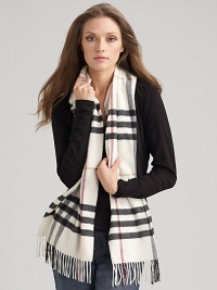 Luxurious cashmere in this oversized check is an all-time classic favorite. Cashmere 12 X 66Dry clean Made in Scotland Luxurious cashmere in this oversized check is an all-time classic favorite. Cashmere 12 X 66Dry clean Made in Scotland