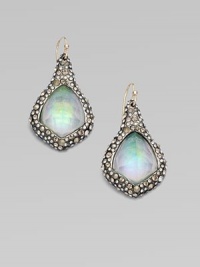 From the Miss Havisham Collection. A free-form diamond shape of dyed white quartz has an opal-like iridescence, enhanced by a shimmering border set with Swarovski crystals.Dyed white quartzCrystalRuthenium platingLength, about 1¾Ear wireMade in USA