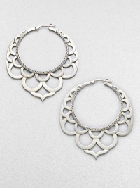 From the Naga Collection. Elegant openwork creates lacy drama in these striking sterling silver hoops.Sterling silverDiameter, about 2.2PiercedMade in Bali From the Naga Collection. Elegant openwork creates lacy drama in these striking sterling silver hoops.Sterling silverDiameter, about 2.2PiercedMade in Bali