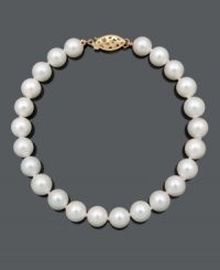 A classic look for the sophisticated woman. This elegant strand features A quality cultured freshwater pearls (6-7mm) and a 14k gold clasp. Approximate length: 7-1/2 inches. A classic look for the sophisticated woman. This elegant strand features A quality cultured freshwater pearls (6-7mm) and a 14k gold clasp. Approximate length: 7-1/2 inches.