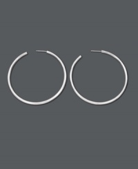 Don't be afraid to wear them big! Large hoop earrings make a bold fashion statement. These hoops feature a smooth, rounded design in sterling silver. Approximate diameter: 2-1/6 inches. Don't be afraid to wear them big! Large hoop earrings make a bold fashion statement. These hoops feature a smooth, rounded design in sterling silver. Approximate diameter: 2-1/6 inches.
