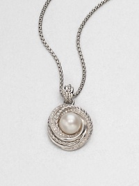From the Pearl Crossover Collection. A luminous freshwater pearl surrounded by a swirl of dazzling diamonds and sleek sterling silver cables on a box chain. Freshwater pearlDiamonds, .28 tcwSterling silverLength, about 17-18 adjustablePendant size, about .4Lobster clasp closureImported From the Pearl Crossover Collection. A luminous freshwater pearl surrounded by a swirl of dazzling diamonds and sleek sterling silver cables on a box chain. Freshwater pearlDiamonds, .28 tcwSterling silverLength, about 17-18 adjustablePendant size, about .4Lobster clasp closureImported