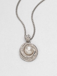 From the Pearl Crossover Collection. A luminous freshwater pearl surrounded by a swirl of dazzling diamonds and sleek sterling silver cables on a box chain. Freshwater pearlDiamonds, .28 tcwSterling silverLength, about 17-18 adjustablePendant size, about .4Lobster clasp closureImported