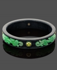 Diversify your style. This exotic bangle bracelet features a solid onyx setting (16-17 mm) with scrolls of intricate jade (5 mm), and a round-cut peridot (2-1/4 ct. t.w.) edged by 14k gold accents. Approximate diameter: 2-1/2 inches. Diversify your style. This exotic bangle bracelet features a solid onyx setting (16-17 mm) with scrolls of intricate jade (5 mm), and a round-cut peridot (2-1/4 ct. t.w.) edged by 14k gold accents. Approximate diameter: 2-1/2 inches.