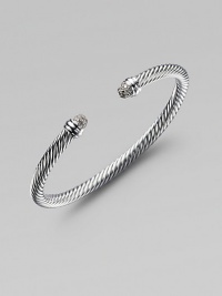 A classic Yurman cable design, in sterling silver with sparkling end caps of pavé diamonds. Diamonds, 0.30 tcw Sterling silver Cable, 5mm Diameter, about 2½ Made in USA A classic Yurman cable design, in sterling silver with sparkling end caps of pavé diamonds. Diamonds, 0.30 tcw Sterling silver Cable, 5mm Diameter, about 2½ Made in USA