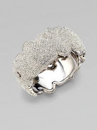 An arresting design that dazzles in plated rhodium. Brass Hinged, box and tongue closure Diameter, about 2¼ Width, about 1¼ Imported 