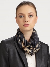 Sumptuous silk satin is bedecked with a bold cheetah print and designer signature.SilkAbout 70 X 180Dry cleanMade in Italy Sumptuous silk satin is bedecked with a bold cheetah print and designer signature.SilkAbout 70 X 180Dry cleanMade in Italy