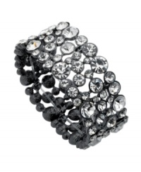 Add icy sparkle to a casual, corporate or cocktail look with this crystal-accented bracelet by GUESS. Crafted in hematite-plated mixed metal. Stretches to fit wrist. Approximate diameter: 2-1/4 inches. Add icy sparkle to a casual, corporate or cocktail look with this crystal-accented bracelet by GUESS. Crafted in hematite-plated mixed metal. Stretches to fit wrist. Approximate diameter: 2-1/4 inches.
