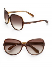 Oversized retro plastic frames. Available in havana striated with brown gradient lens or black/black check with gray gradient lens. Logo temples 100% UV protection Imported Oversized retro plastic frames. Available in havana striated with brown gradient lens or black/black check with gray gradient lens. Logo temples 100% UV protection Imported