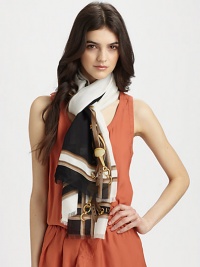 A striking horsebit and belt print adorns this plush, silk-blend wrap with handmade fringe ends.65% modal/35% silkAbout 28 X 70Dry cleanMade in Italy A striking horsebit and belt print adorns this plush, silk-blend wrap with handmade fringe ends.65% modal/35% silkAbout 28 X 70Dry cleanMade in Italy