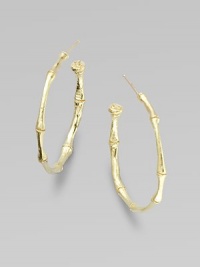 A bamboo hoop in 18K yellow gold for a subtle twist to classic design.18K gold Diameter, about 1 Post backs Made in USA A bamboo hoop in 18K yellow gold for a subtle twist to classic design.18K gold Diameter, about 1 Post backs Made in USA