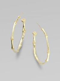 A bamboo hoop in 18K yellow gold for a subtle twist to classic design.18K gold Diameter, about 1 Post backs Made in USA 